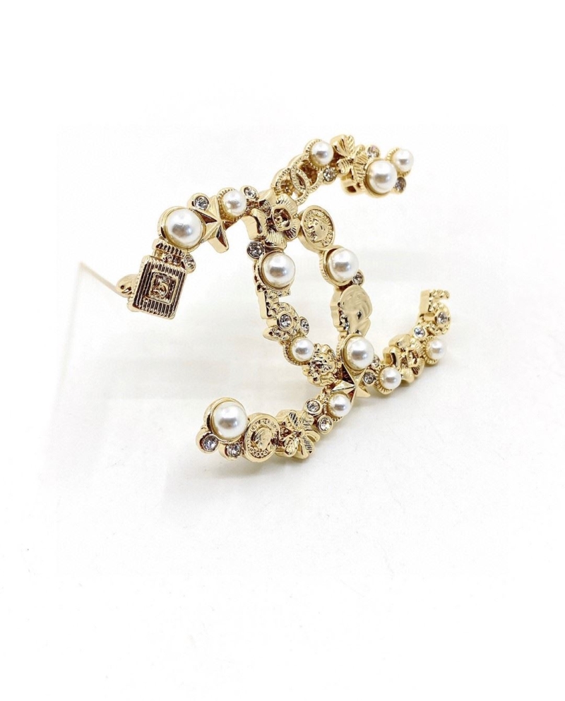 Ch**el brooches